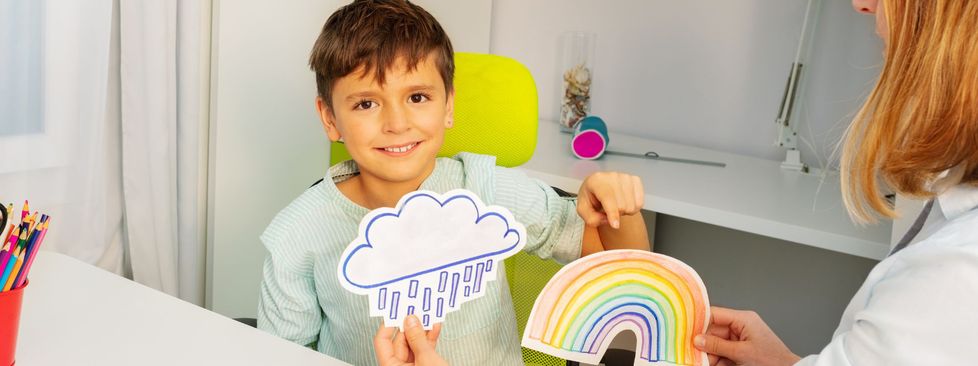 Boy with level 1 Autism Learning about the Weather